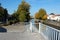 Promenade le long du quai Notre-Dame aÃƒâ€šÃ‚Â Tournai en Belgique en automne. Pont des trous en perspective